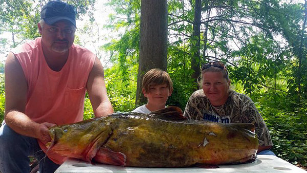 Charles Patchen, 13, and his moather and stepfather Jeanette and Bryan Atwell. FWC photo