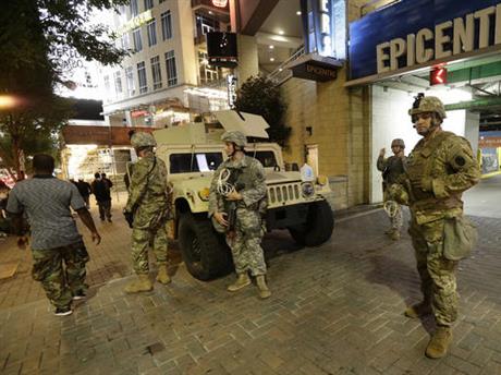 ational Guardsman stand on the street in downtown Charlotte, N.C. on Thursday_222023