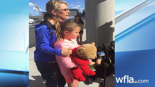 Girl reunited with bear_276373