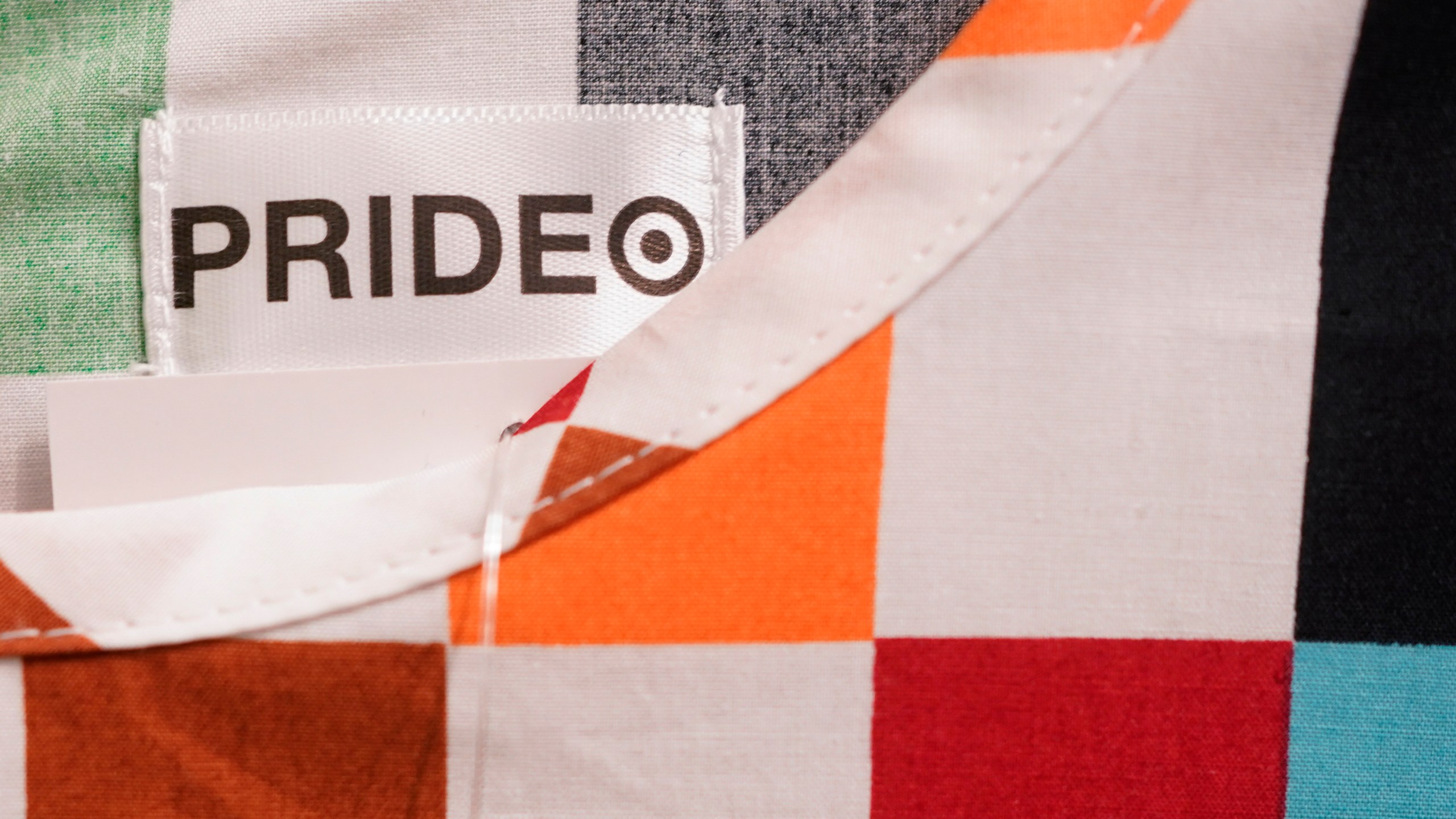 Pride month merchandise is displayed at the front of a Target store in Hackensack, N.J., Wednesday, May 24, 2023. Target is removing certain items from its stores and making other changes to its LGBTQ+ merchandise nationwide ahead of Pride month after an intense backlash from some customers including violent confrontations with its workers. (AP Photo/Seth Wenig)