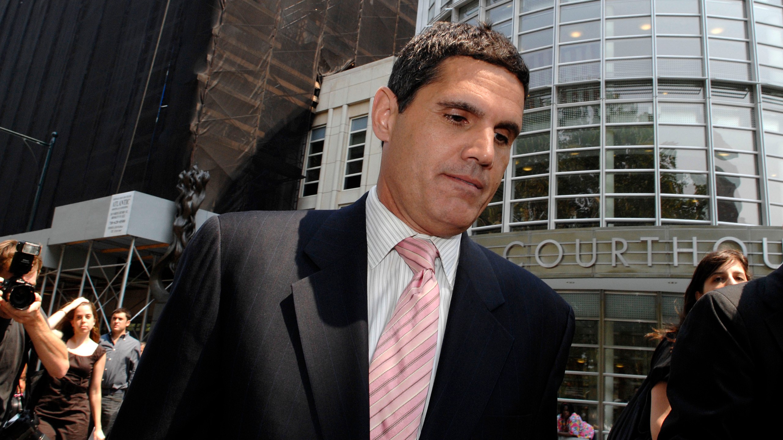 FILE - Attorney John Lauro exits Brooklyn federal court following a news conference on Aug. 15, 2007, in New York. Donald Trump's legal team is characterizing his indictment in the special counsel's 2020 election interference investigation as an attack on the former president's right to free speech. But prosecutors say the case is not merely about Trump's lies but also about the efforts he took to subvert the election. (AP Photo/ Louis Lanzano, File)