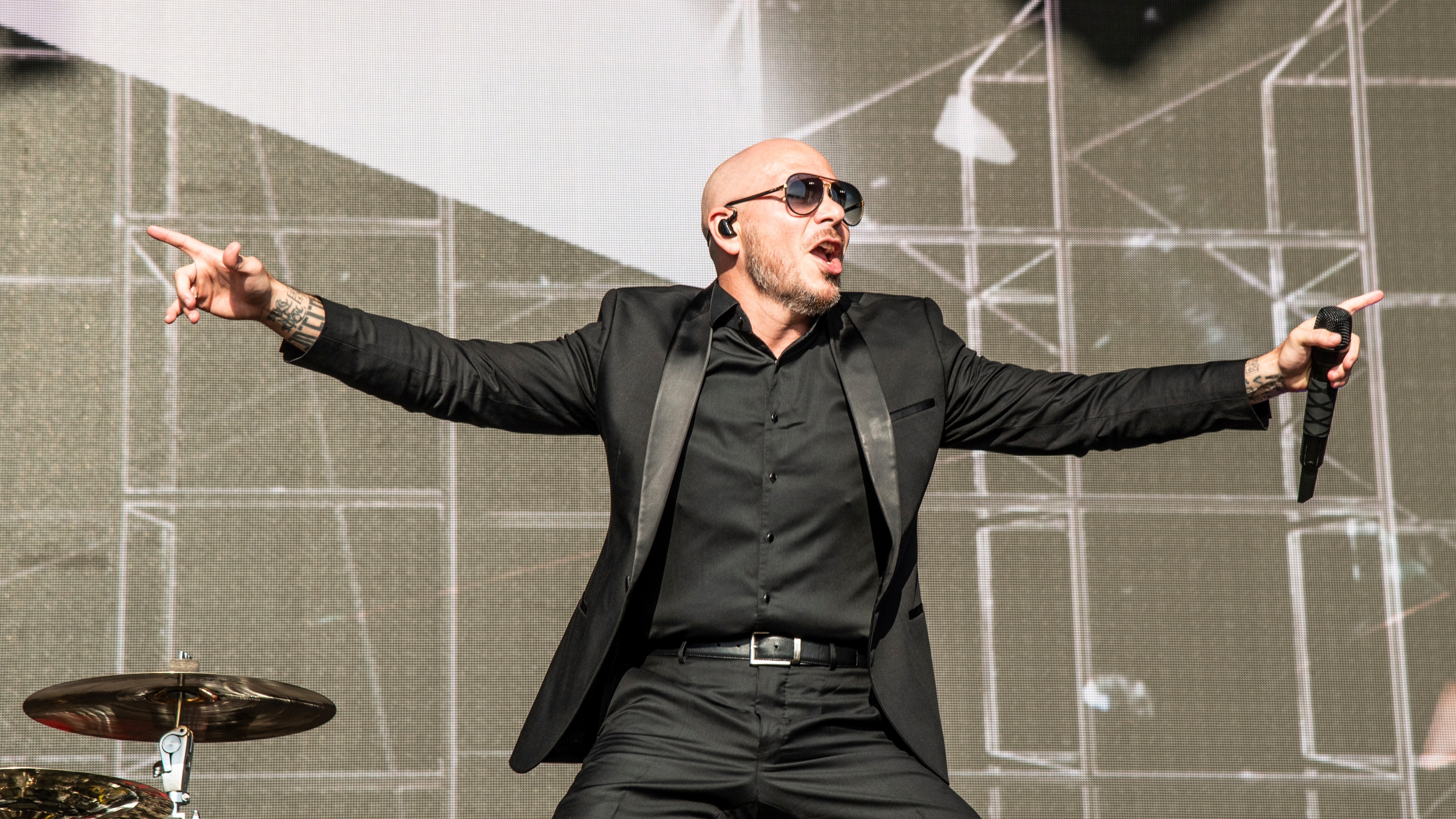 Pitbull performs at the New Orleans Jazz and Heritage Festival on Saturday, May 4, 2019, in New Orleans. (Photo by Amy Harris/Invision/AP)