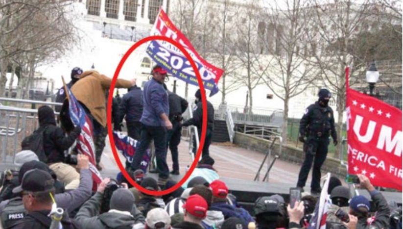 Schubert, circled in red, outside of the Capitol building. (DOJ) 