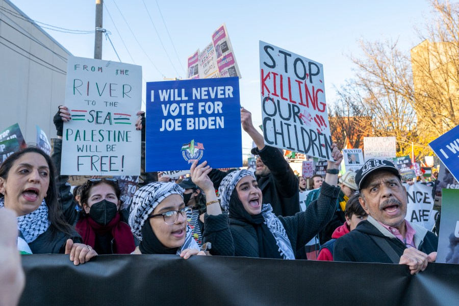 Around a thousand Palestinian and pro-Palestinian demonstrators rally at the corner of W. Hubbard St. and N. Armour St. near where President Joe Biden was attending a fundraising event in the West Town neighborhood of Chicago, Thursday, Nov. 9, 2023. Demonstrators were demanding that the President as well as national Democrats use their power to broker a ceasefire between Israel and Hamas whose conflict has killed thousands of civilians most of whom are Palestinian. (Tyler Pasciak LaRiviere/Chicago Sun-Times via AP)