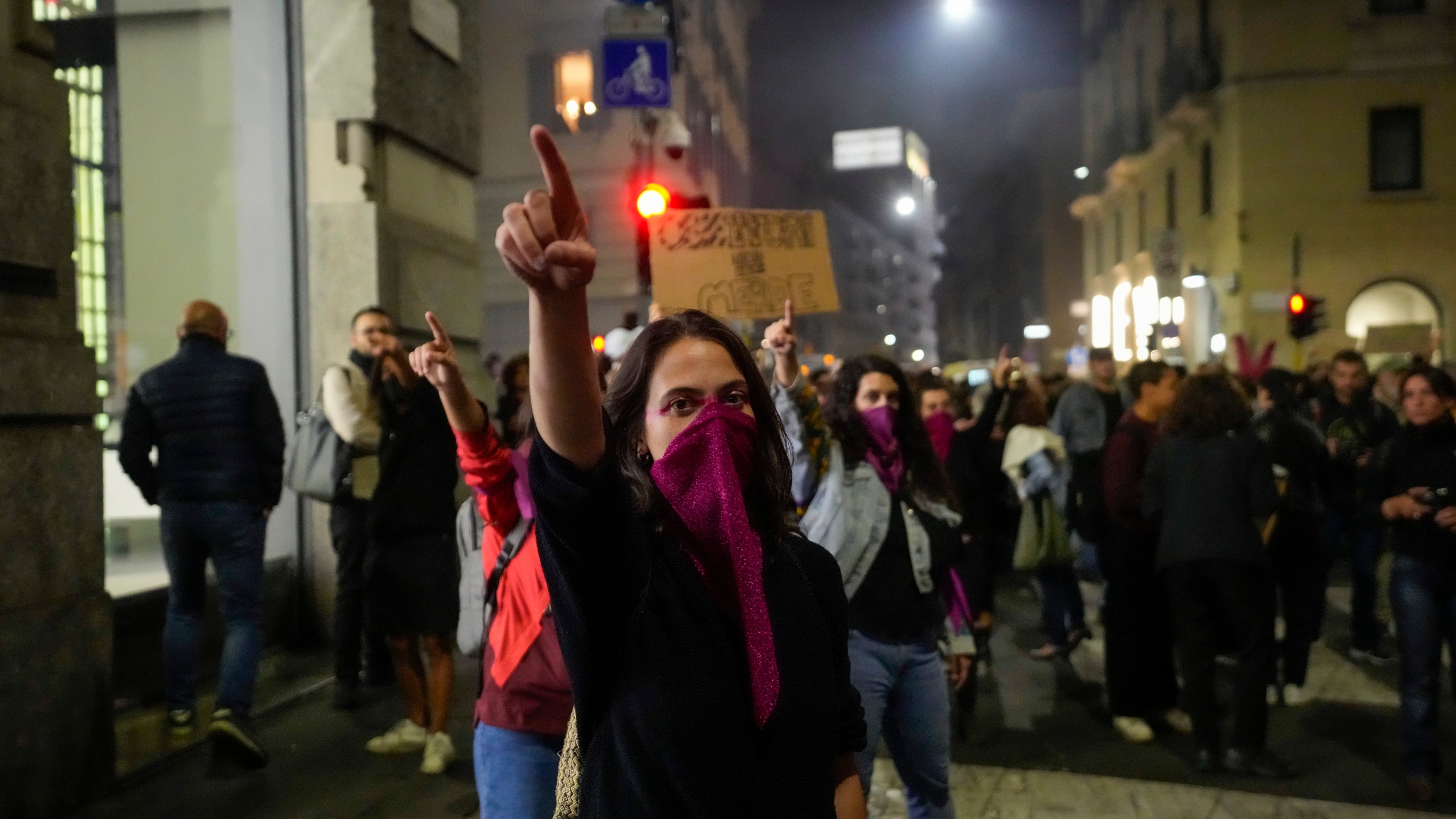 FILE - People stage a protest on 'International Safe Abortion Day' to ask for more guarantees on the enforcement of the abortion law that they claim is seriously endangered by the high rate of doctors' conscientious objection in the country, in Milan, on Sept. 28, 2022. Italy resisted Vatican pressure and guaranteed access to abortion starting in 1978, allowing women to terminate pregnancies upon request in the first 12 weeks of pregnancy, or later if her health or life is endangered. (AP Photo/Luca Bruno, File)